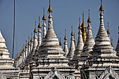 Myanmar - Mandalay, Sandamuni Pagoda. The entire ground is covered with 1749 small white pagodas with stone slabs with the Buddhist Tripitaka. 